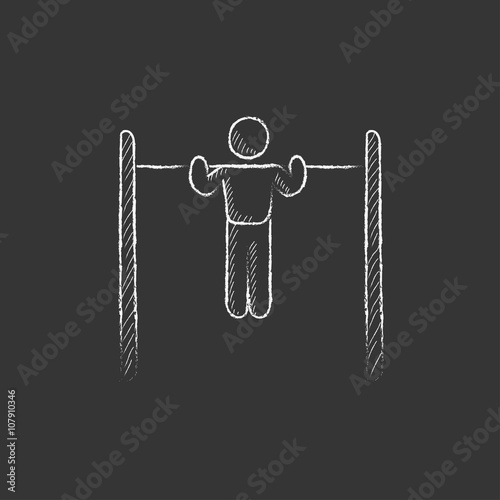 Gymnast exercising on bar. Drawn in chalk icon.