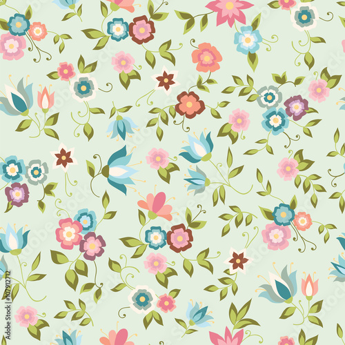 Seamless background with pink and blue flowers. Floral pattern.