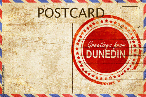 dunedin stamp on a vintage, old postcard