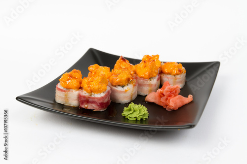 Image of tasty hot sushi set with bacon
