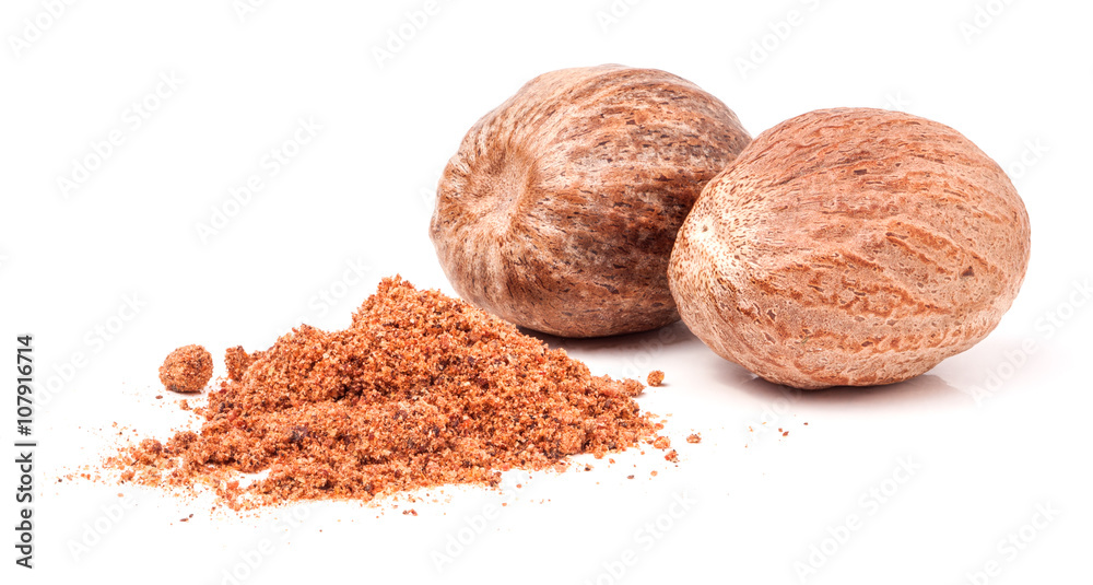 Two nutmeg whole isolated on white background Two nutmeg whole isolated on white background