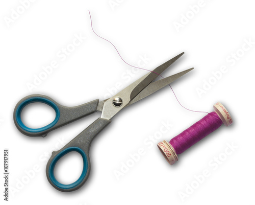 scissors cutting thread