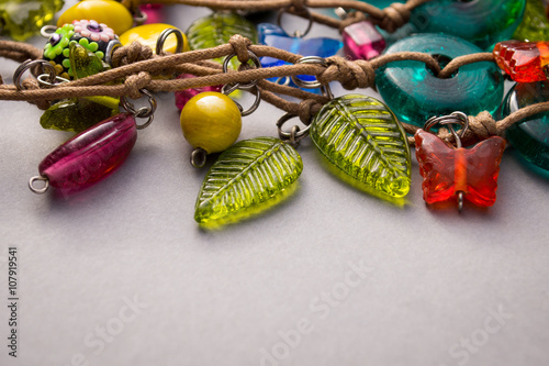 Fototapeta Naklejka Na Ścianę i Meble -  Colorful assortment of glass and wood beads