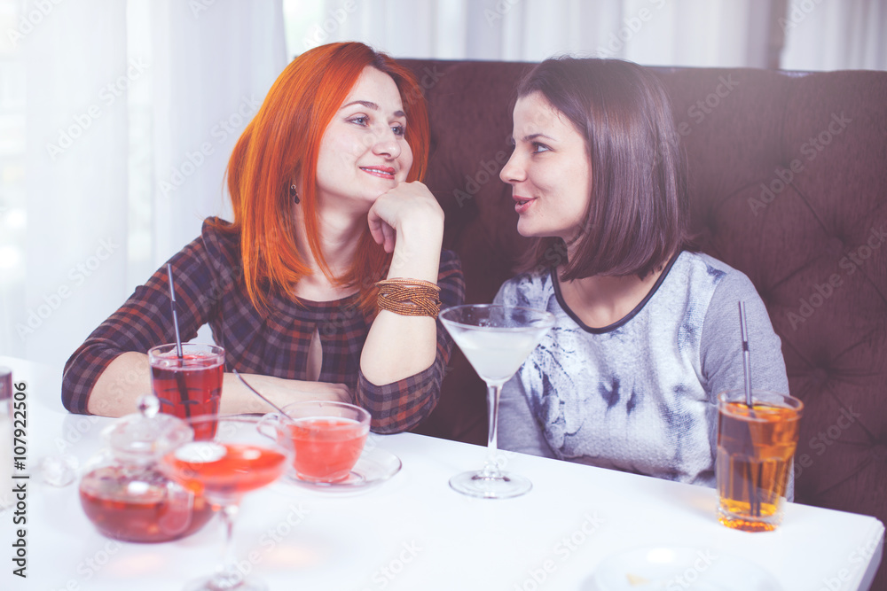 Female Friends Enjoying Cocktail Bar. Female Friends Enjoying Cocktail Bar.