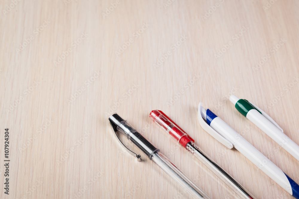 Set of colored pens on table Set of colored pens on table