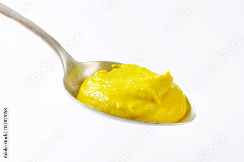 Spoonful of yellow musstard