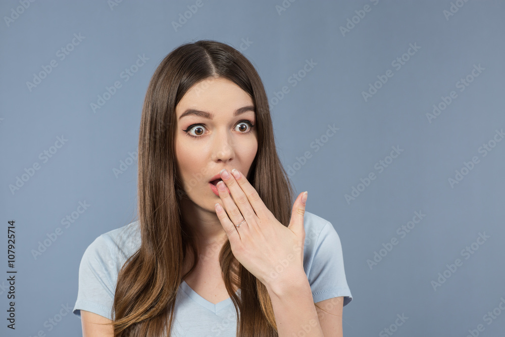 Pleasant girl expressing surprise 