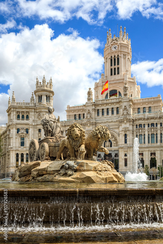 Cibeles fountain at Plaza de Cibeles in Madrid in a beautiful summer day, Spain