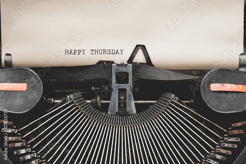 Happy Thursday on typewriter , vintage tone.