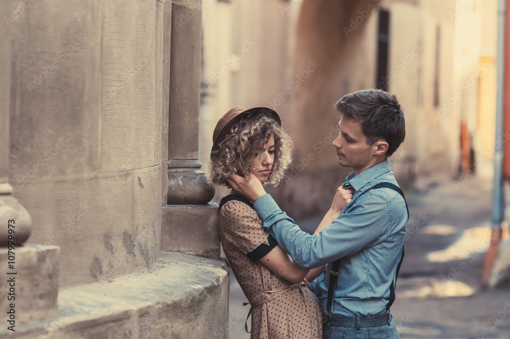 loving couple walking in the morning in the old town