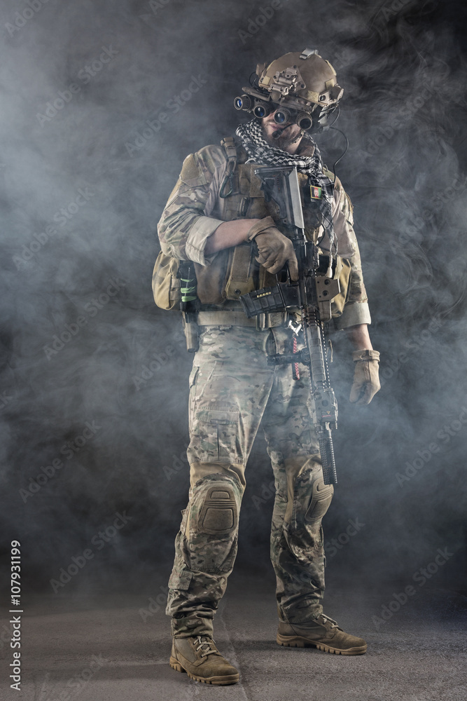 US Army Soldier with goggles in the Smoke US Army Soldier with goggles in the Smoke
