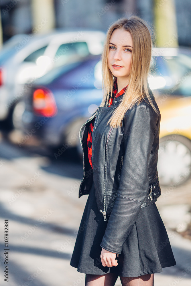 Portrait of young pretty girl standing on the street Portrait of young pretty girl standing on the street
