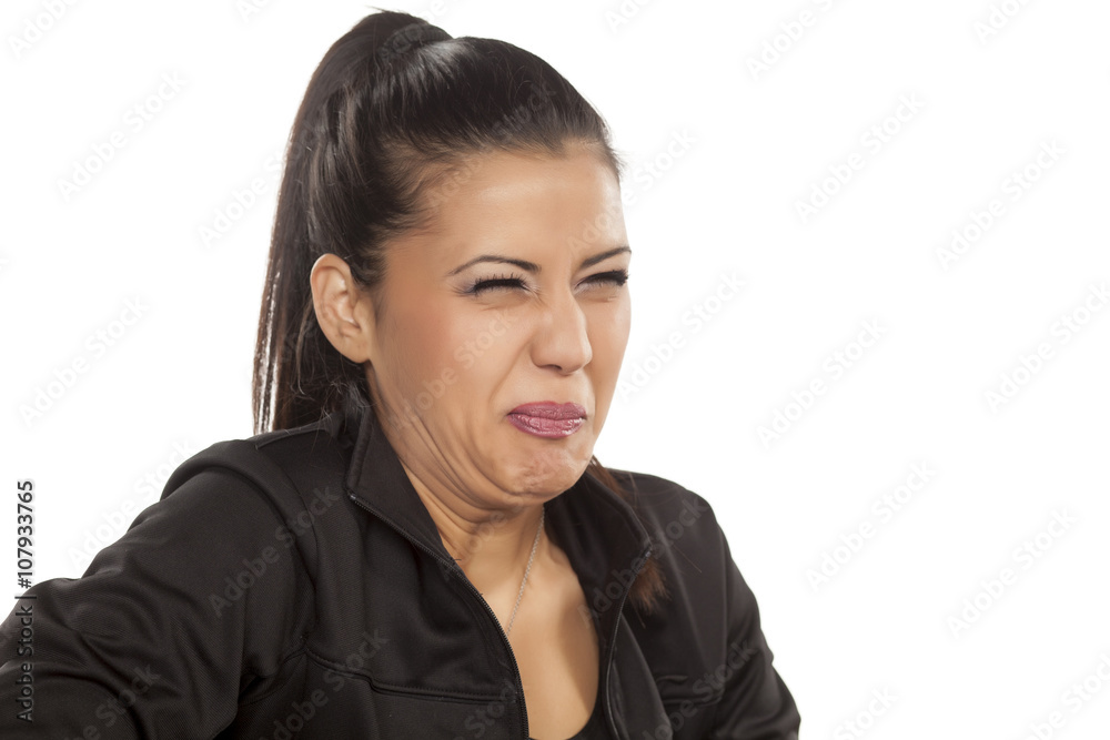 beautiful young woman is disgusted by something beautiful young woman is disgusted by something