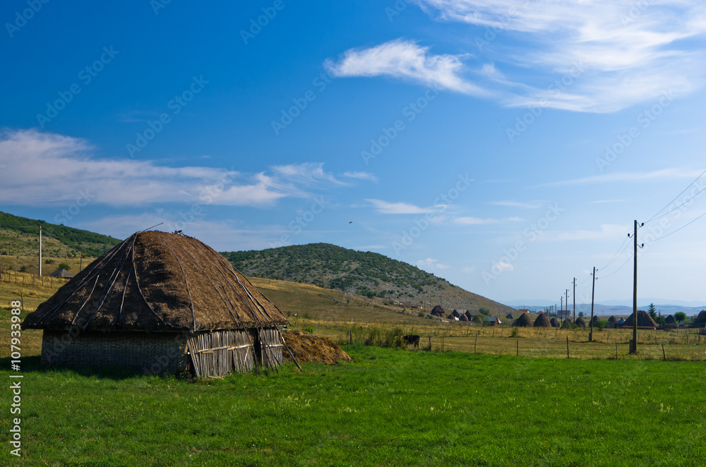 Rural wooden lodge at Pešter plateau landscape in southwest Serbia