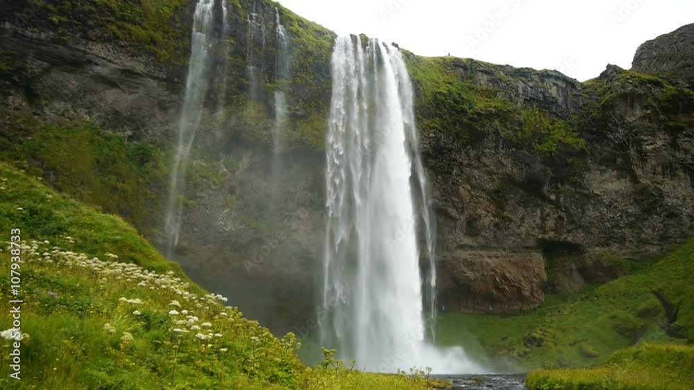 The famous Seljalandsfoss waterfall in the south of Iceland. The famous Seljalandsfoss waterfall in the south of Iceland.