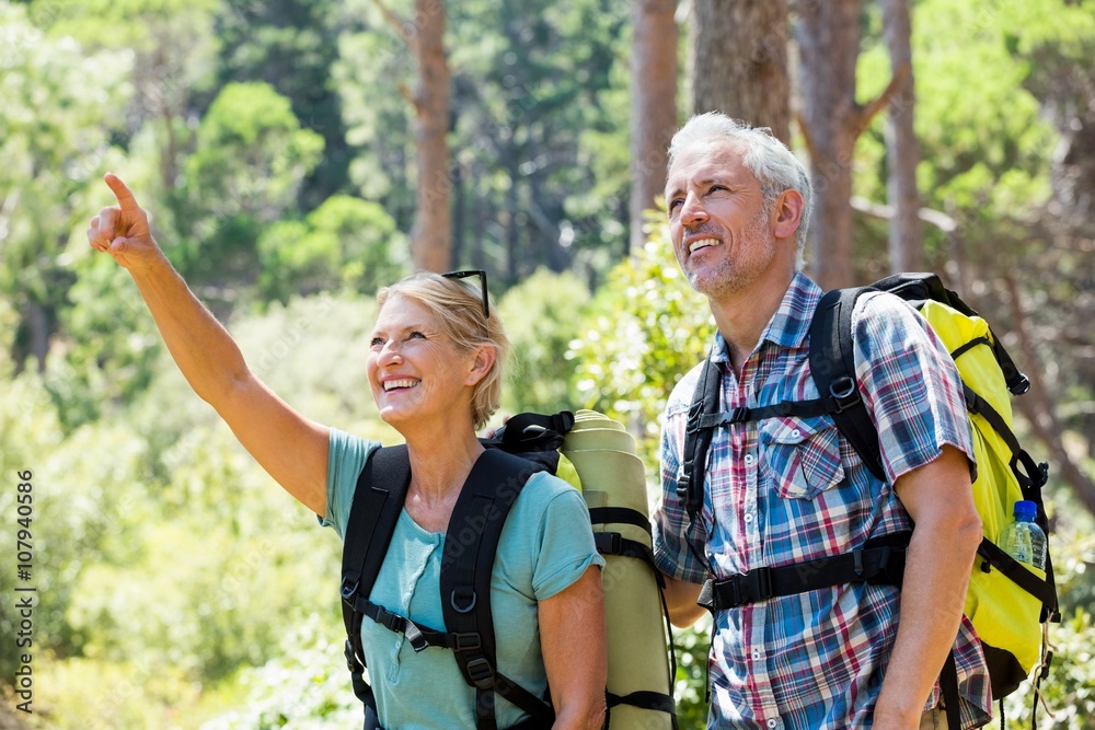 senior couple standing and smiling senior couple standing and smiling