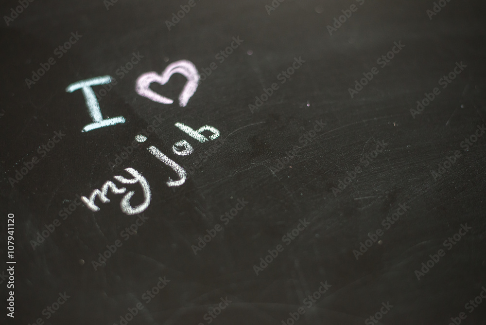 Fototapeta premium Text i love my job written with chalk in old board