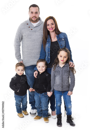 attractive portrait of young happy family over white background © Louis-Photo