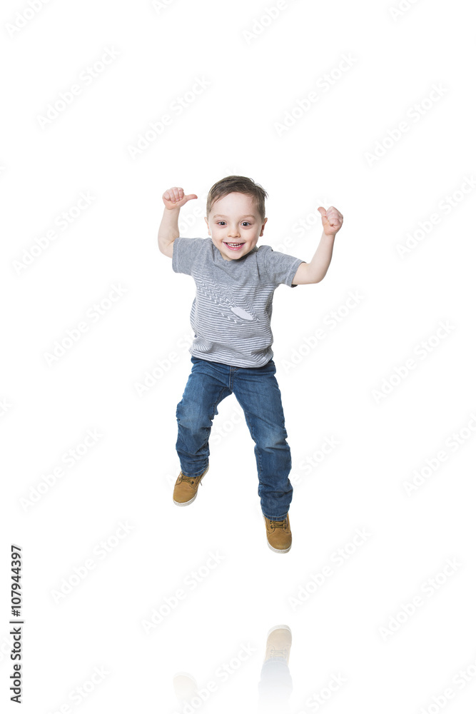 Little boy jumping in the air