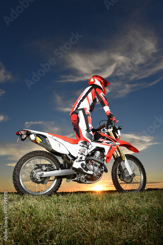 Fototapeta Naklejka Na Ścianę i Meble -  Man on Motocross Motorcycle