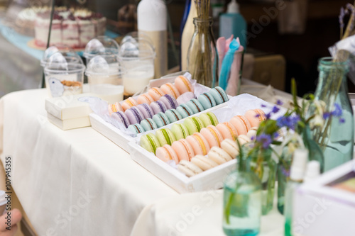 Flavored colorful French macarons on a sale