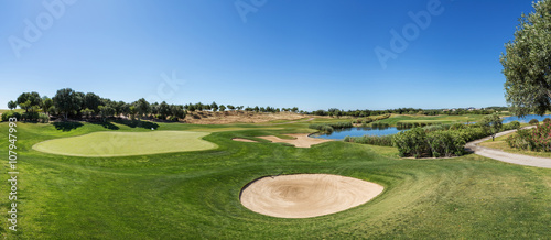 Canvas Print Panorama of a golf course sand trap and collar.