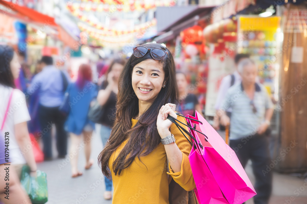 asian woman shopping outdoor