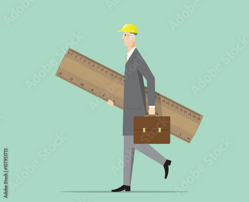 Architect carrying a big wooden ruler.