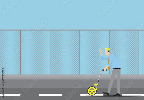 Surveyor measuring distance with surveyor’s wheel.