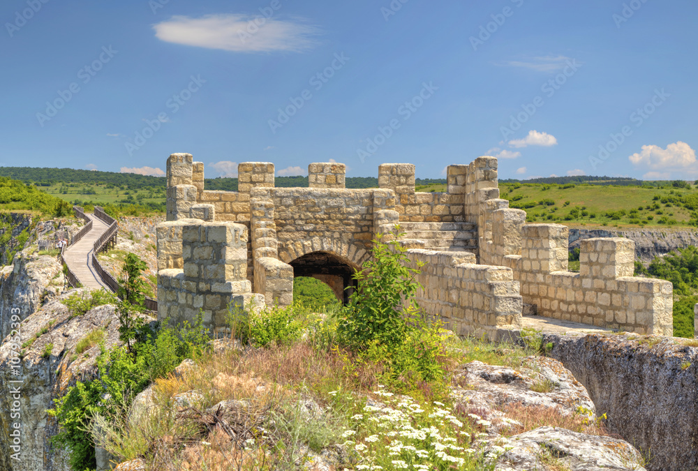 Fototapeta premium Stone walls and gate of ancient fortress