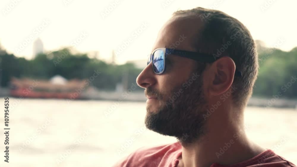 Young, happy man riding boat on river in Bangkok, Thailand
Young, happy man riding boat on river in Bangkok, Thailand
