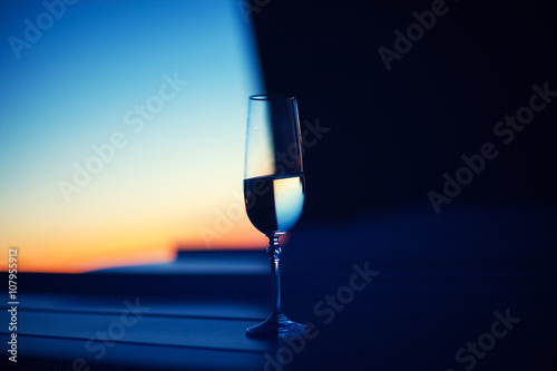 wine glass against a sunset