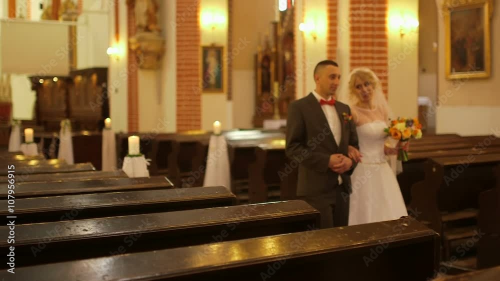 Wedding couple exiting church