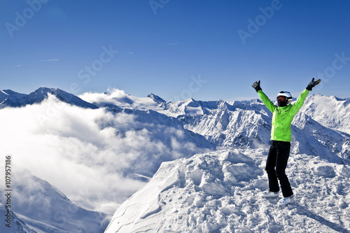 young woman is enjoying winter sports in Austrian Alps © bint87