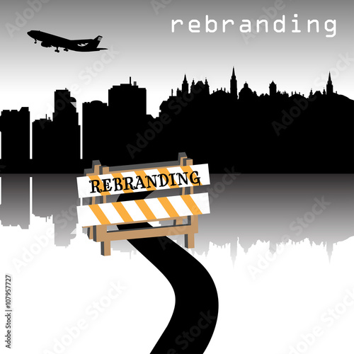 Abstract colorful illustration with a road leading into a city and a sign with the text rebranding blocking the road