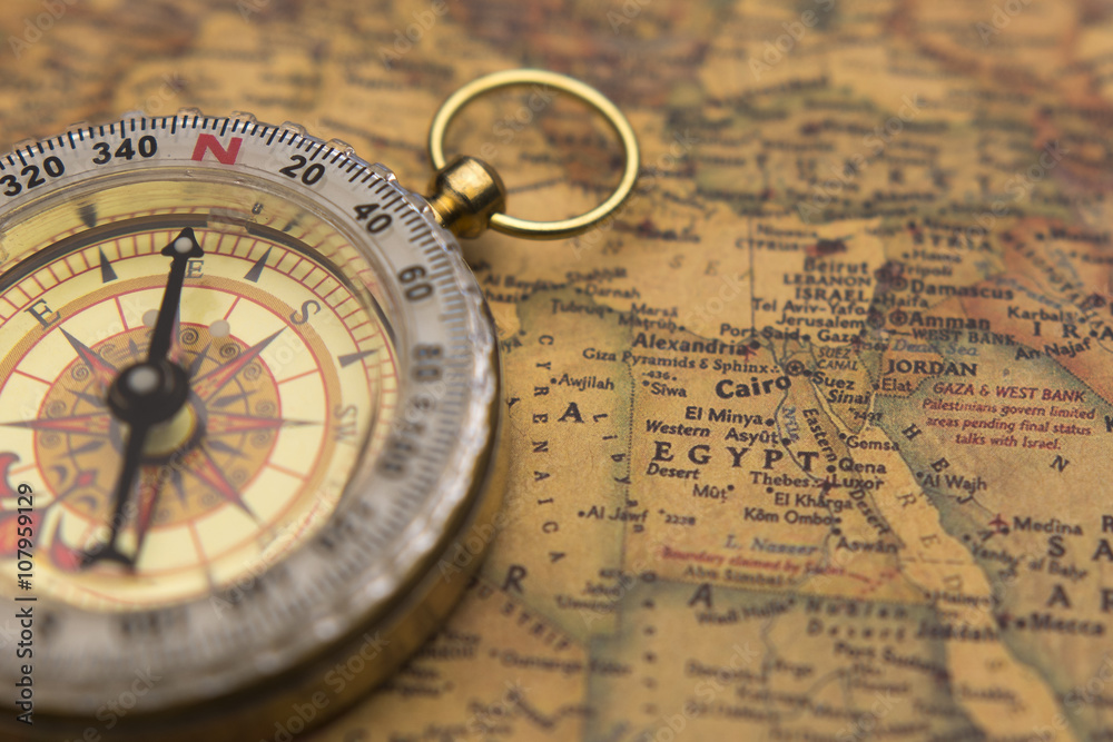 Old compass on vintage map selective focus on Egypt Stock Photo | Adobe  Stock