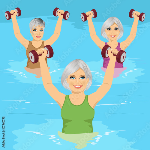 senior women making aqua gym exercises with dumbbells in swimming pool