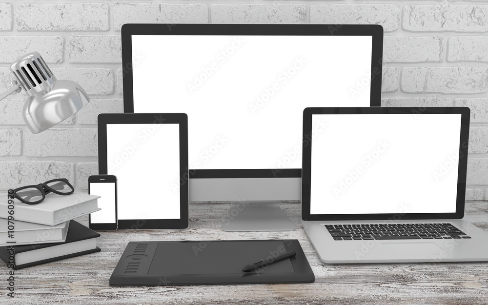 Responsive mockup screen. Monitor, laptop, tablet, phone on table in office. 3d rendering. Responsive mockup screen. Monitor, laptop, tablet, phone on table in office. 3d rendering.