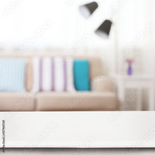 Empty wooden table and blur...