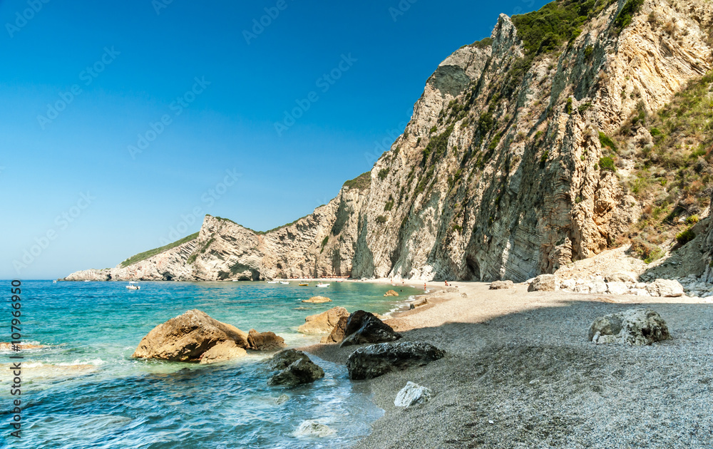 Paradise Beach, Corfu Island, Greece. Paradise Beach is one of the most beautiful beaches in Corfu Island. It is located near Liapades village at south of Paleokastritsa