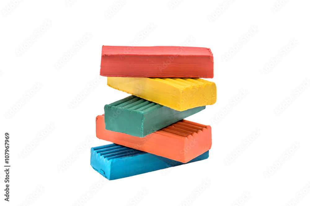 Pile of colorful children's plasticine isolate on white Pile of colorful children's plasticine isolate on white