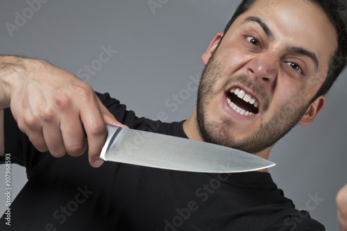 angry man with knife photo