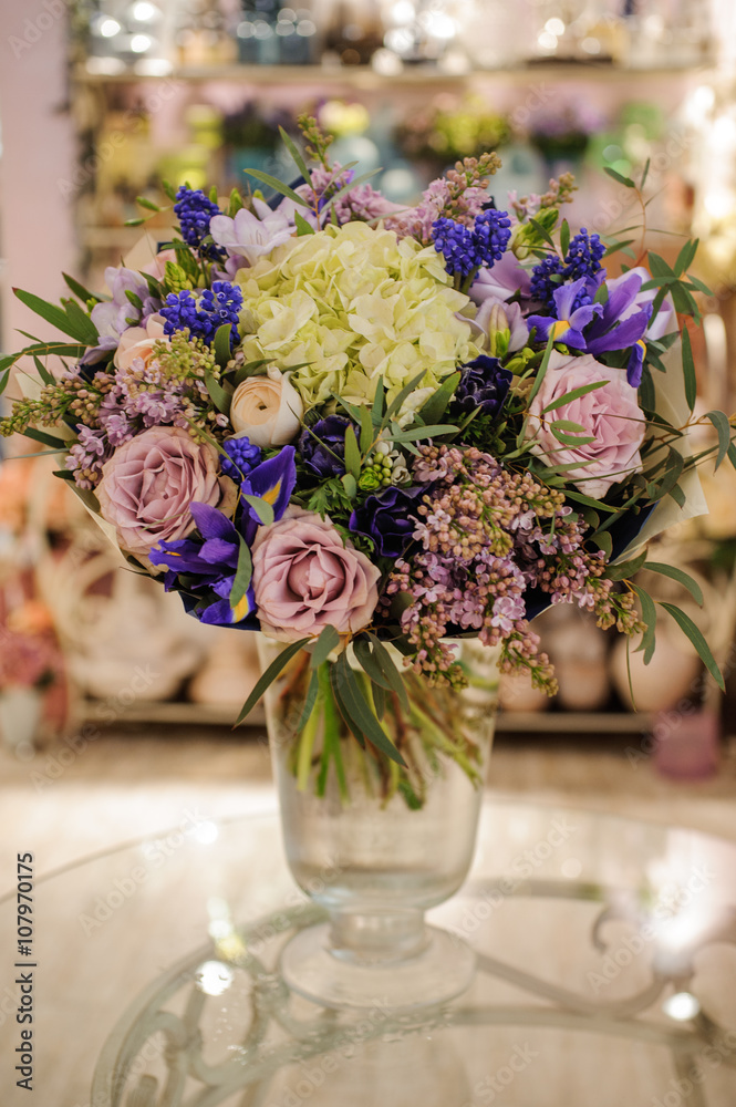 Bouquet with purple , blue and white different flowers