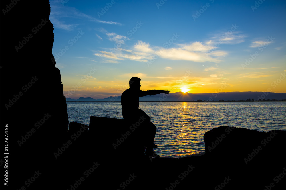 Silhouette,man facing the horizon