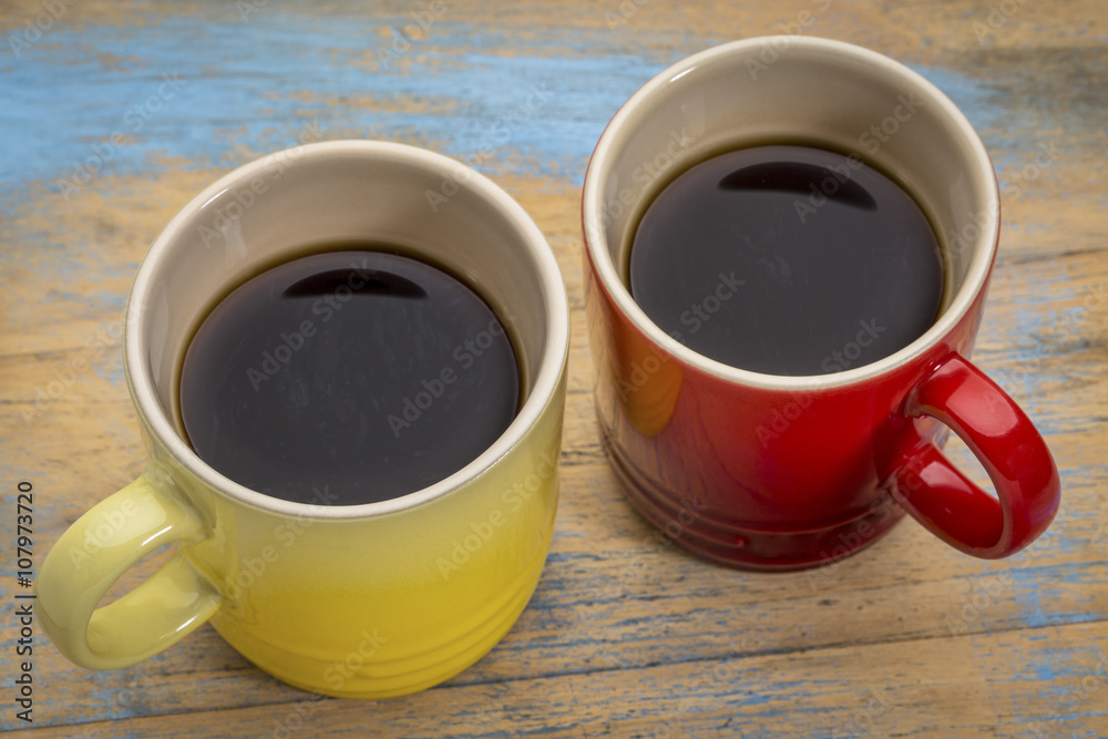 Fototapeta two cups of espresso coffee