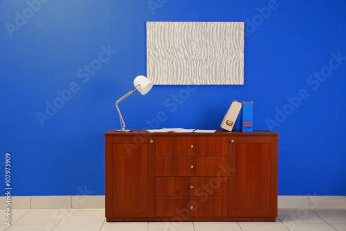 Wooden chest of drawers on ...