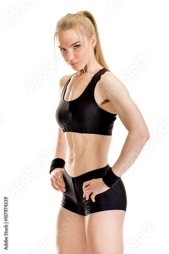 Young muscular woman posing