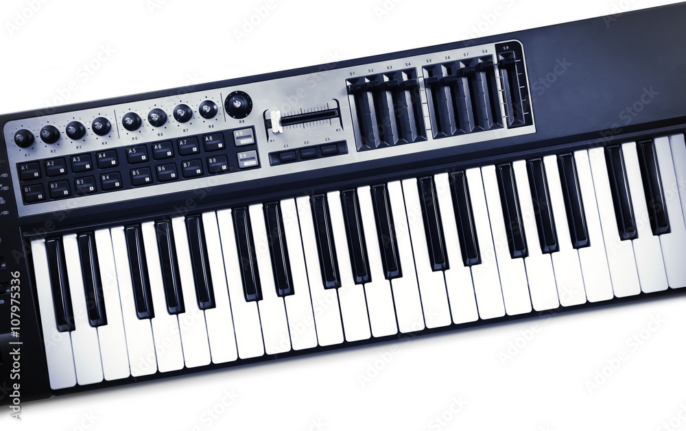 Fototapeta premium Keyboard of synthesizer closeup