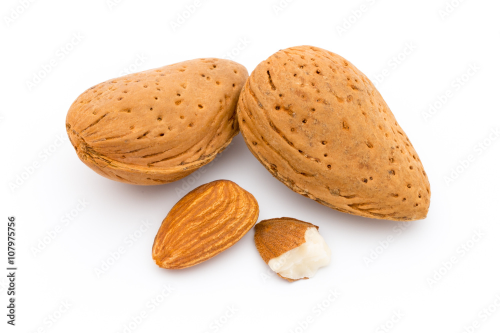 Group of almond nuts. Isolated on a white background. Group of almond nuts. Isolated on a white background.