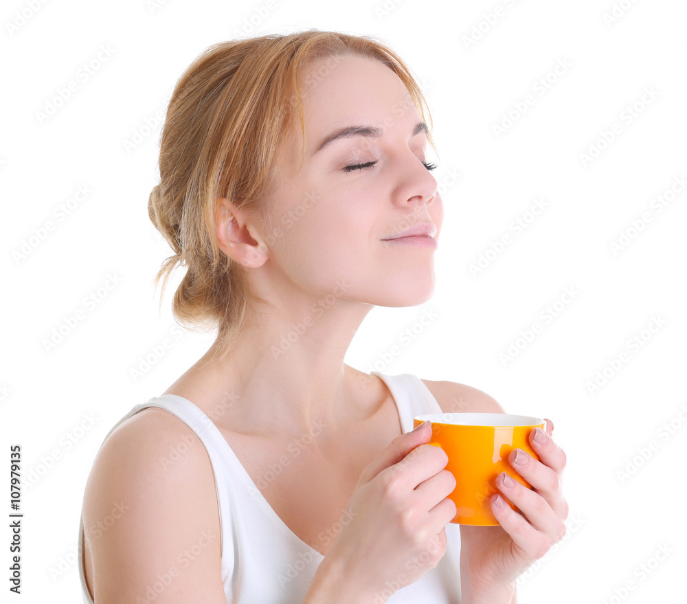 Beautiful girl enjoying a cup of tea, isolated on white Beautiful girl enjoying a cup of tea, isolated on white